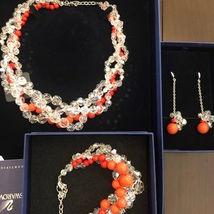 Swarovski set: necklace, bracelet and earrings.